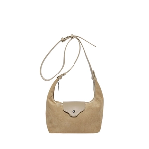 Minimalist beige hobo bag with suede texture and adjustable shoulder strap for women