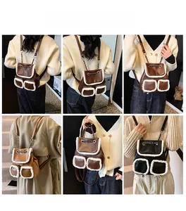 Detail showing plush trim accents and metal chain on faux leather backpacks in multi-colors