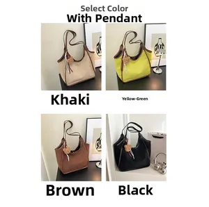 Minimalist bucket bag color options including khaki, green, brown, and black with bear charm