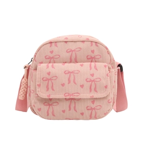 Sac bandoulière rose en velours côtelé avec motifs nœuds et sangle réglable