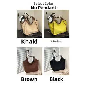 Canvas bucket bag detail showing color options in khaki, green, brown and black