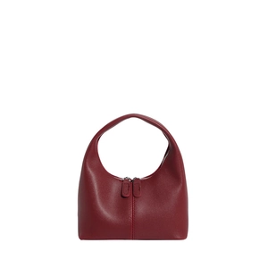 Minimalist burgundy crescent handbag with smooth matte finish and dual zipper closure
