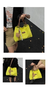 Lime green quilted tote bag with brown leather handles and cute plush bear charm
