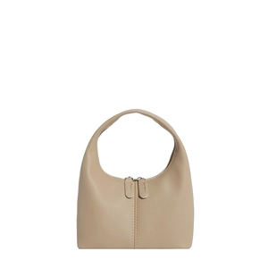 Minimalist beige dumpling handbag with dual zippers and elegant curved handle