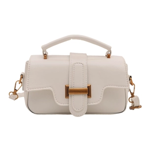 Chic off-white faux leather crossbody bag with golden buckle and textured finish
