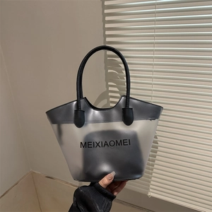 Minimalist gradient translucent tote bag with black inner pouch and brand lettering