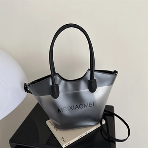 Silver jelly tote bag with black MEIXIAOMEI lettering and round top handles