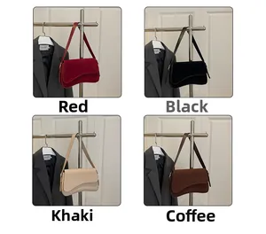 Four colors of vintage crossbody bags shown on hangers with elegant suede-like finish