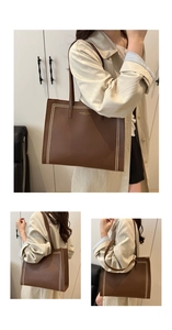 Gros plan sur le sac fourre-tout en cuir marron avec coutures blanches contrastées