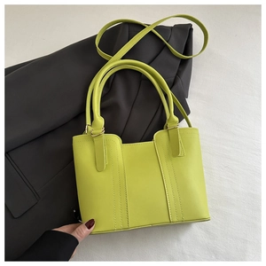 Elegant lime green bucket handbag for women with vertical stitching and crossbody strap