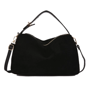 Retro black matte tote bag with shoulder strap and gold hardware in minimalist style