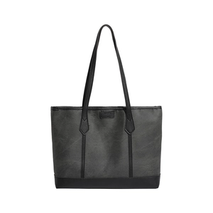 Fashion tote bag with grey canvas body and black leather trim for autumn 2025 commute