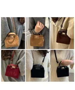 Detail shots of four vintage matte leather crossbody bags with metal twist-lock closures