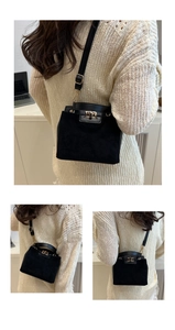 Three lifestyle shots of a black faux suede flap bag with a gold lock and thin strap