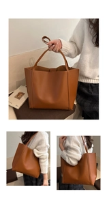 Detail showing the brown faux leather tote bag being held and worn over the shoulder