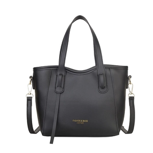 French style black bucket bag with gold lettering and adjustable crossbody strap