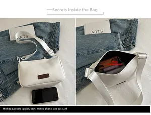 Detail view of white canvas crossbody bag with interior storage space for phone and keys