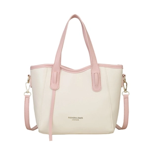 Minimalist beige and pink leather tote bag for women with gold hardware accents