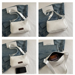 Detail view of white crossbody bag showing front, back and internal storage capacity