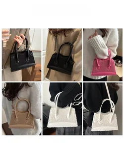 Detail of plush faux fur handbag showing crossbody and handheld styling in four colors
