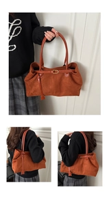 Brown suede tote bag with metal buckle shown in hand and shoulder carry view