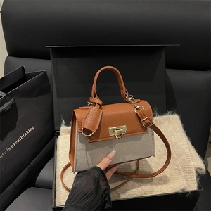 Fashionable brown and beige patchwork small square handbag with golden lock and strap