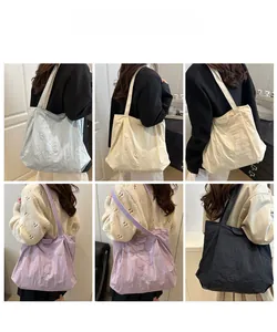 Collage of model carrying various colors of large capacity pleated tote bags in soft shades