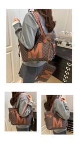 Close-up of a two-piece monogram tote bag set in brown faux leather with a large M logo