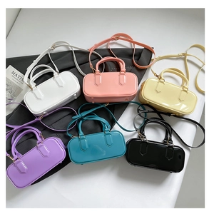Collection of candy-colored glossy jelly pillow bags with adjustable straps in six colors