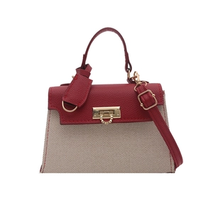 Elegant red and beige patchwork handbag with gold clasp and top handle for women