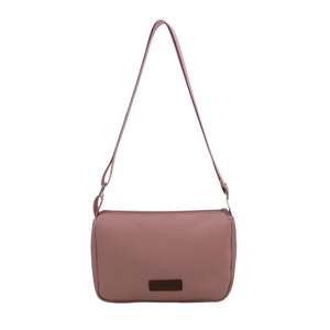 Pink waterproof crossbody bag for women with adjustable strap and fashion label