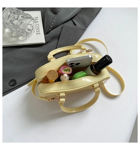 Interior view of yellow glossy tote bag showing spacious space for daily essentials