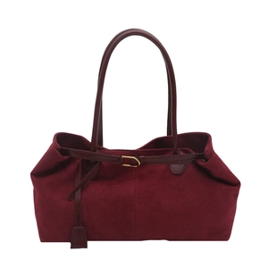 Minimalist burgundy suede tote bag for women with leather handles and gold buckle detail