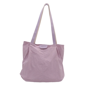 Minimalist light purple nylon tote bag with fashion tag and long shoulder straps