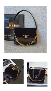 Detail of black crossbody bag with gold chain strap and textured suede leather contrast