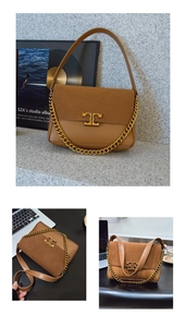 Detail of brown leather and suede shoulder bag with gold chain and interlocking logo buckle