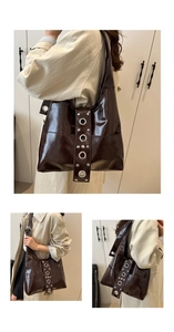 Detail of dark brown patent leather shoulder bag with silver eyelets on the strap