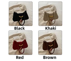 Minimalist baguette shoulder bags in black, khaki, red, and brown with gold metal buckles