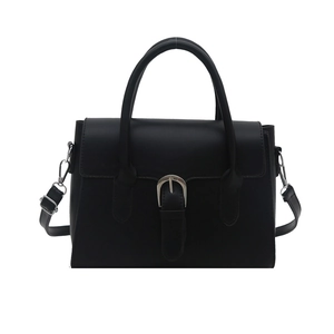 Elegant black matte leather crossbody bag with silver buckle and detachable shoulder strap