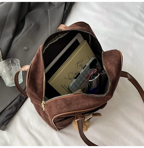 Interior view of large capacity matte suede tote bag showing tablet and essentials