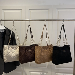 Minimalist quilted corduroy tote bags with chain straps in four classic colors for women