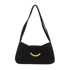 Minimalist black suede baguette shoulder bag with a crescent gold buckle detail