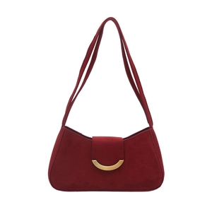 Retro burgundy suede shoulder bag with crescent gold buckle and minimalist strap design