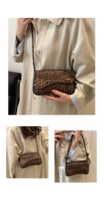 Detail of leopard print shoulder bag featuring textured fabric and flap closure design