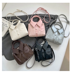 Detailed top view of five textured crossbody bags featuring unique shirt collar designs
