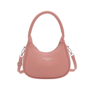Pink crescent moon shoulder bag in faux leather with adjustable strap and silver hardware
