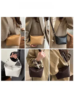 Detail view of woven leather shoulder bags in five colors including caramel and black