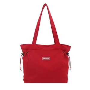 Red minimalist tote bag with side drawstrings and Fashion label on woven fabric