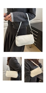Detailed views of glossy white patent leather shoulder bag with silver metallic hardware
