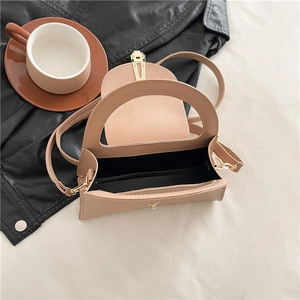Chic beige leather handbag with metal buckle and detachable strap for daily wear